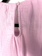 keyhole neck on back of Pact 100% organic cotton tiered midi dress
