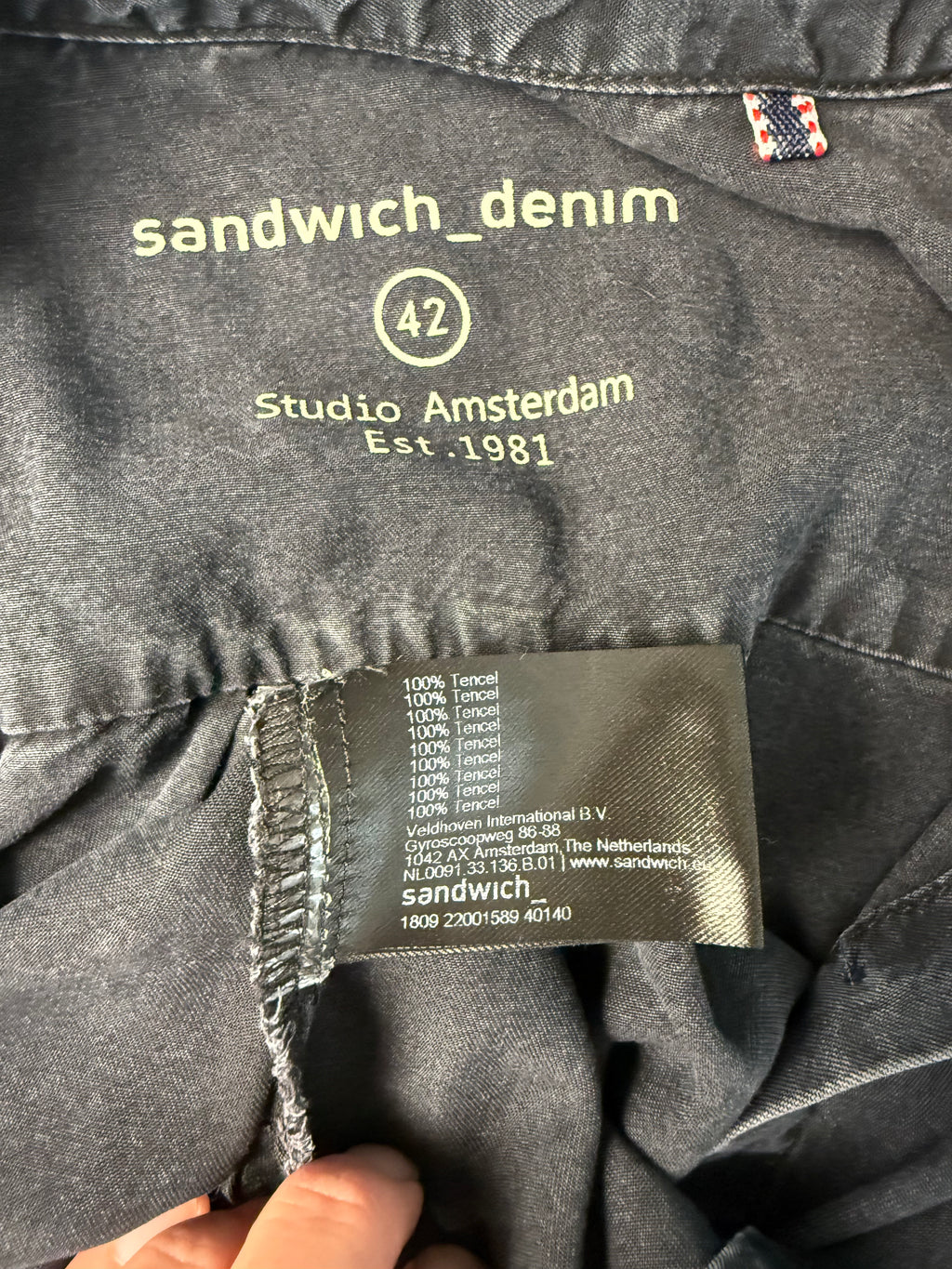 label inside Sandwich Denim Studio Amsterdam charcoal 100% Tencel shirt with stunning hand-applied blue crystal collar embellishment and ruffle cuff detail at Blue Sparrow Shop