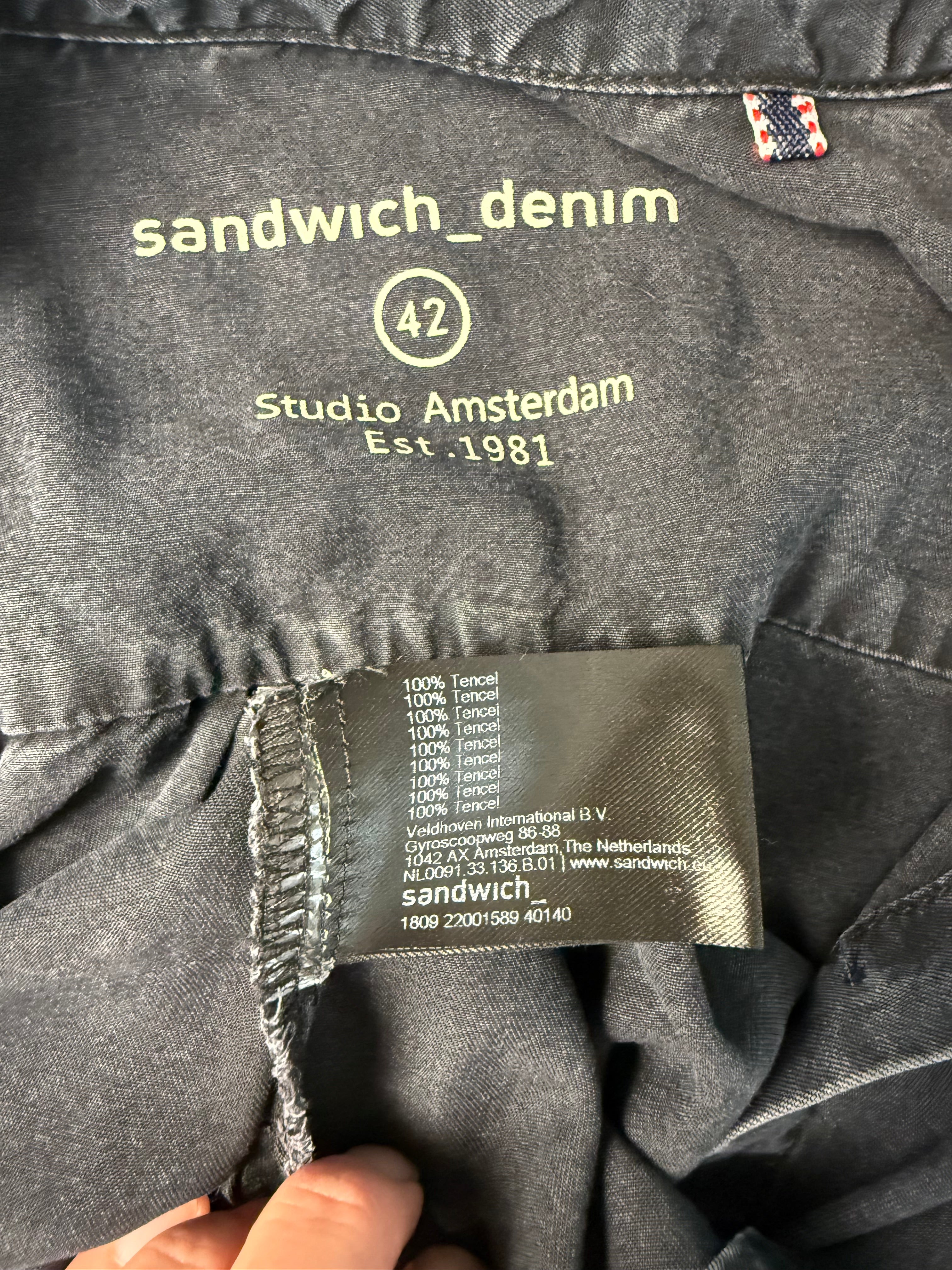 label inside Sandwich Denim Studio Amsterdam charcoal 100% Tencel shirt with stunning hand-applied blue crystal collar embellishment and ruffle cuff detail at Blue Sparrow Shop