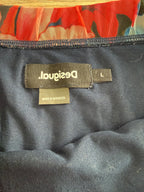label inside boho desigual skirt showing it is clothing made in morocco