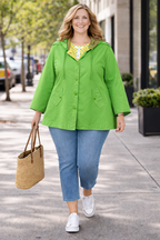 Hooded Rain Poncho | Size M at Blue Sparrow Shop on woman walking outside
