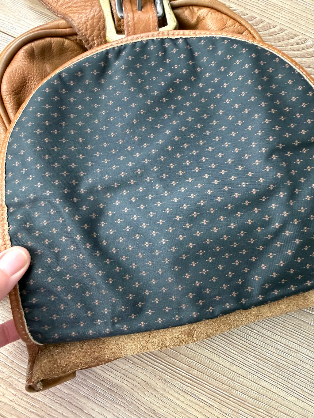 lining under flap of Mesace 1910 Cognac Leather Western Saddle Sling Bag