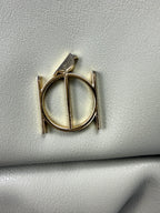 logo on Riona Sage Green Crossbody Bag | RFID  protection travel purse 