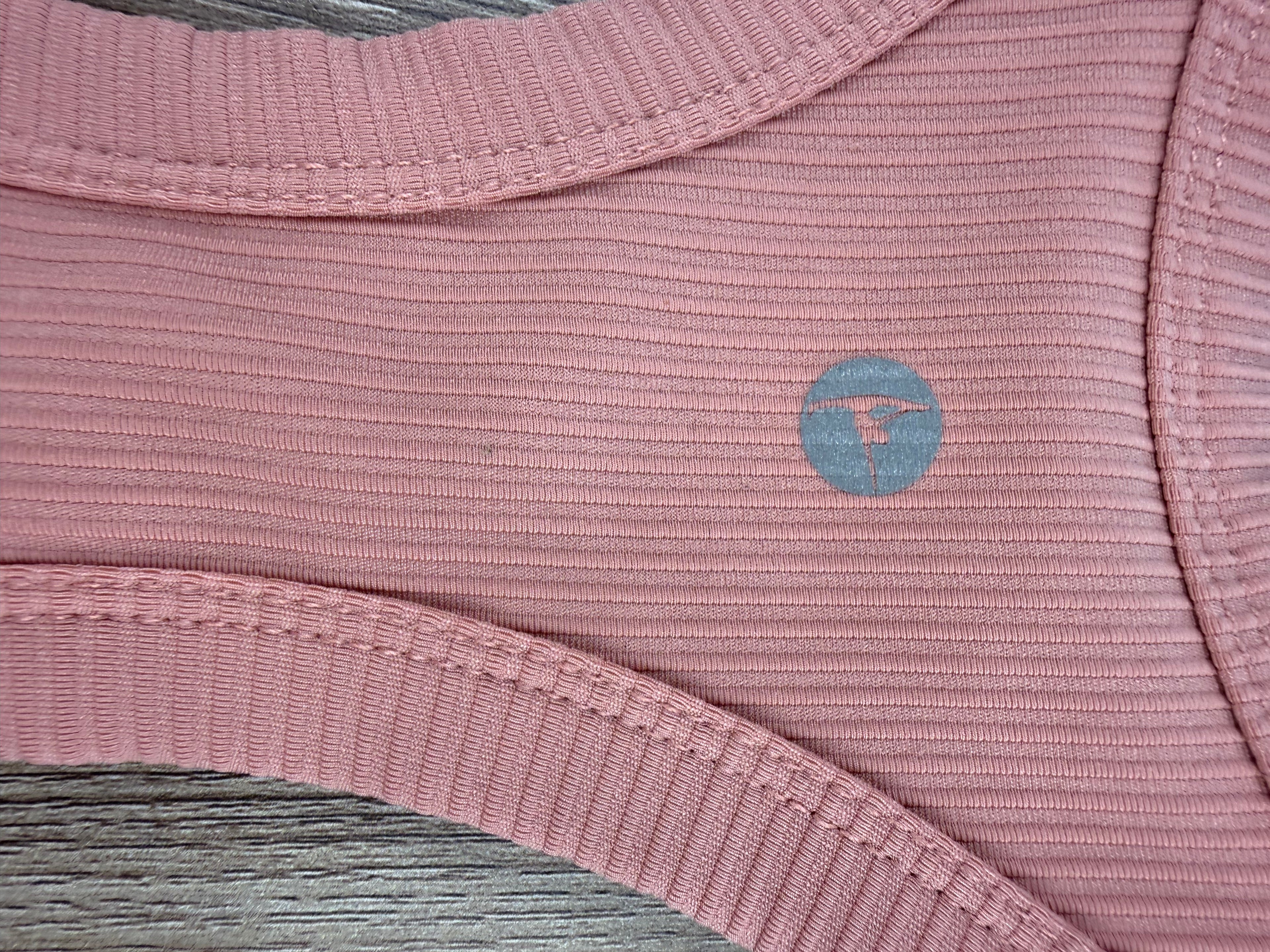 logo on back of 90 Degree by Reflex Ribbed Racerback Tank with shelf bra 