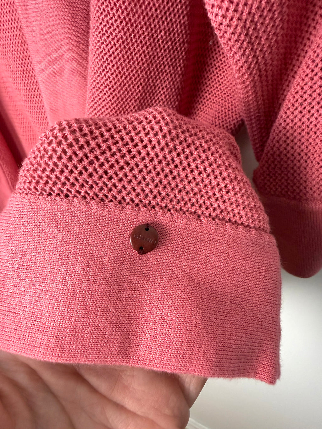 olsen emblem on hem of Olsen 100% Cotton Open Mesh Knit Cardigan at Blue Sparrow Shop