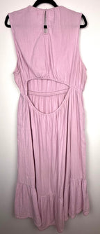 open back of Pact 100% organic cotton tiered midi dress on hanger