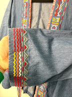oversized denim jacket with southwestern patterned detail on trim  showing close up of cuff
