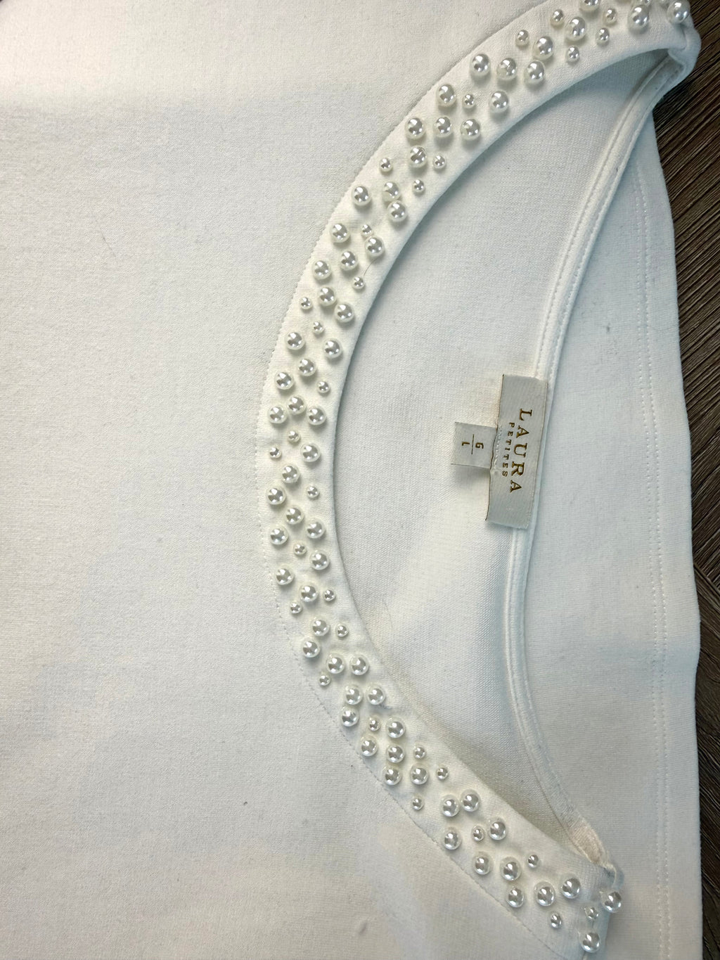 pearl collar detail up close on Laura Petites  Pearl Neckline Top 