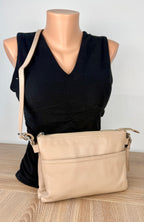 pelle-rfid-leather-crossbody-bag on mannequin to show scale