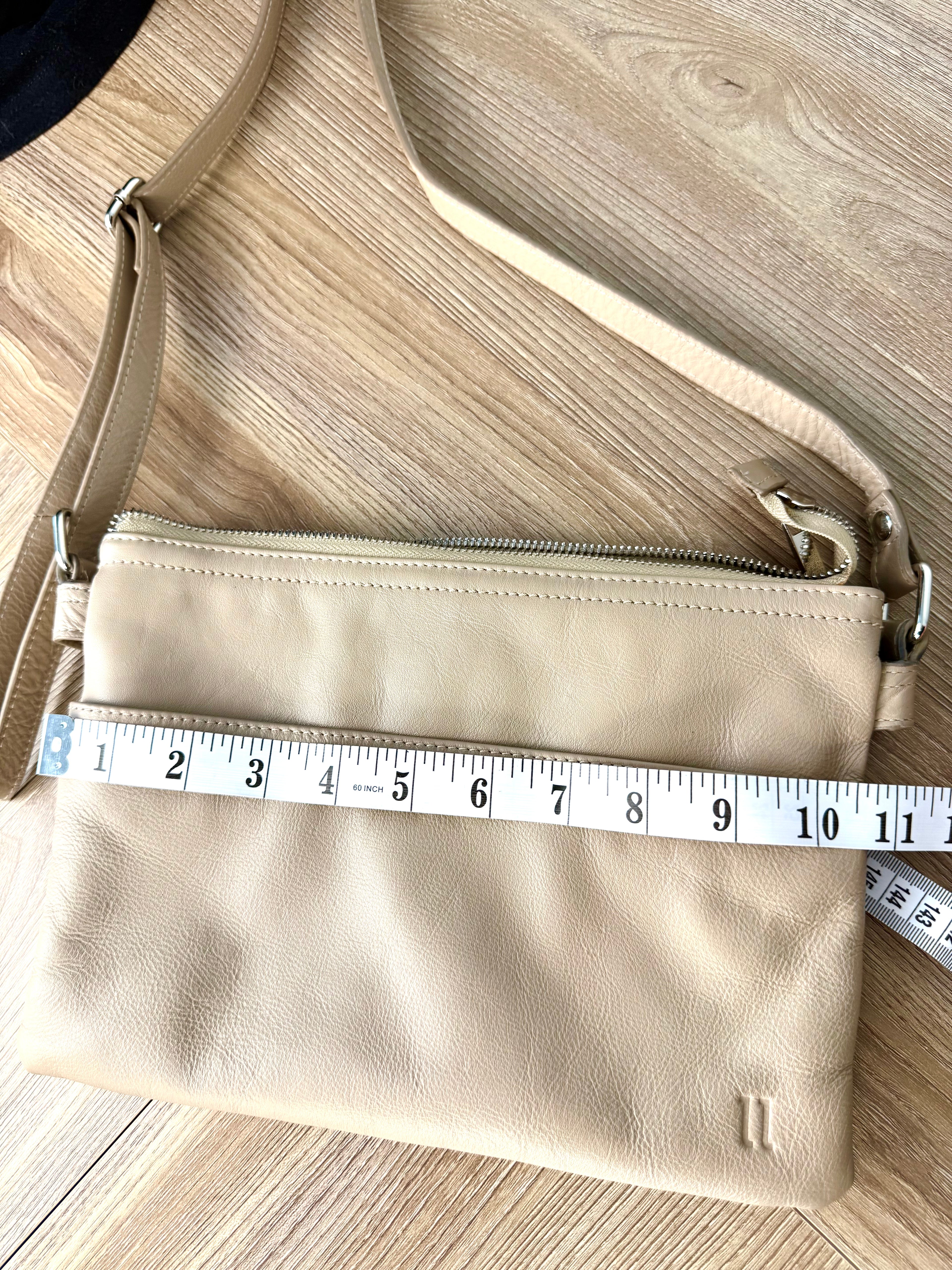 pelle-rfid-leather-crossbody-bag measures 10.5" wide