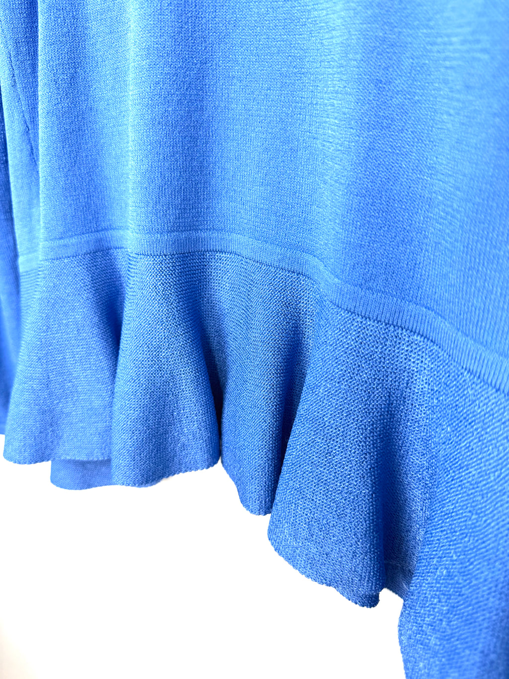 peplum waist detail cornflower blue softly tailored cardigan to expand your capsule wardrobe