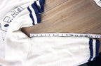 pickleball varsity sweater measuring 15.5" sleeve length
