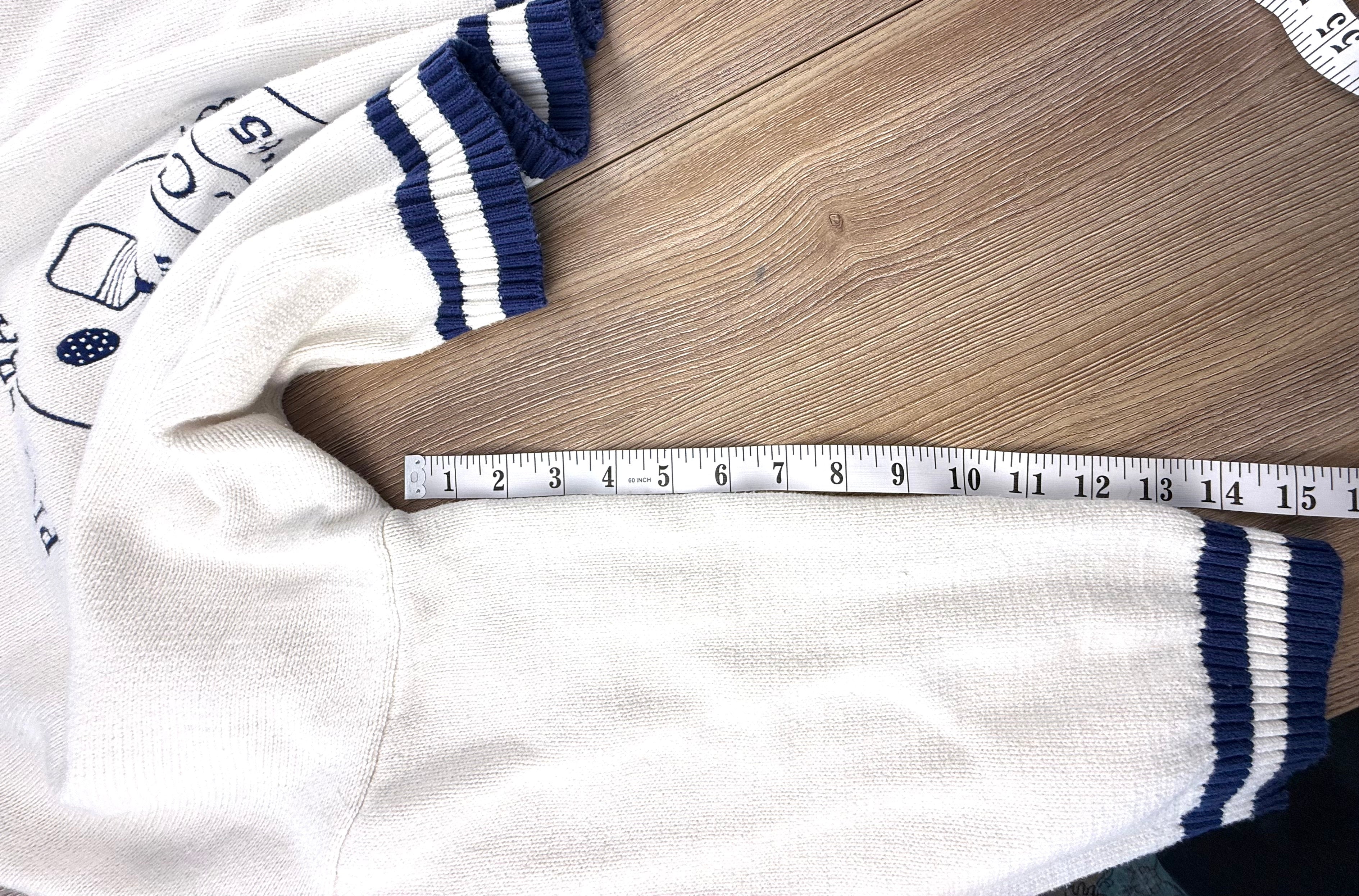 pickleball varsity sweater measuring 15.5" sleeve length