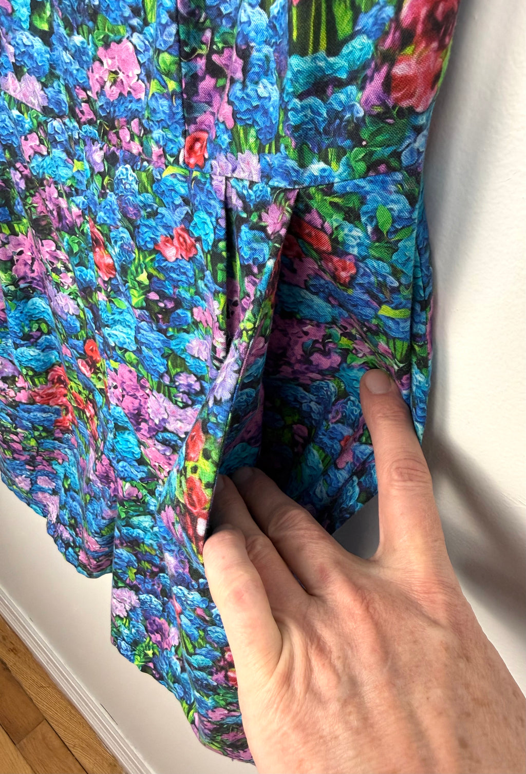 pocket detail on Birds of North America floral romper with impressionist hydrangea print