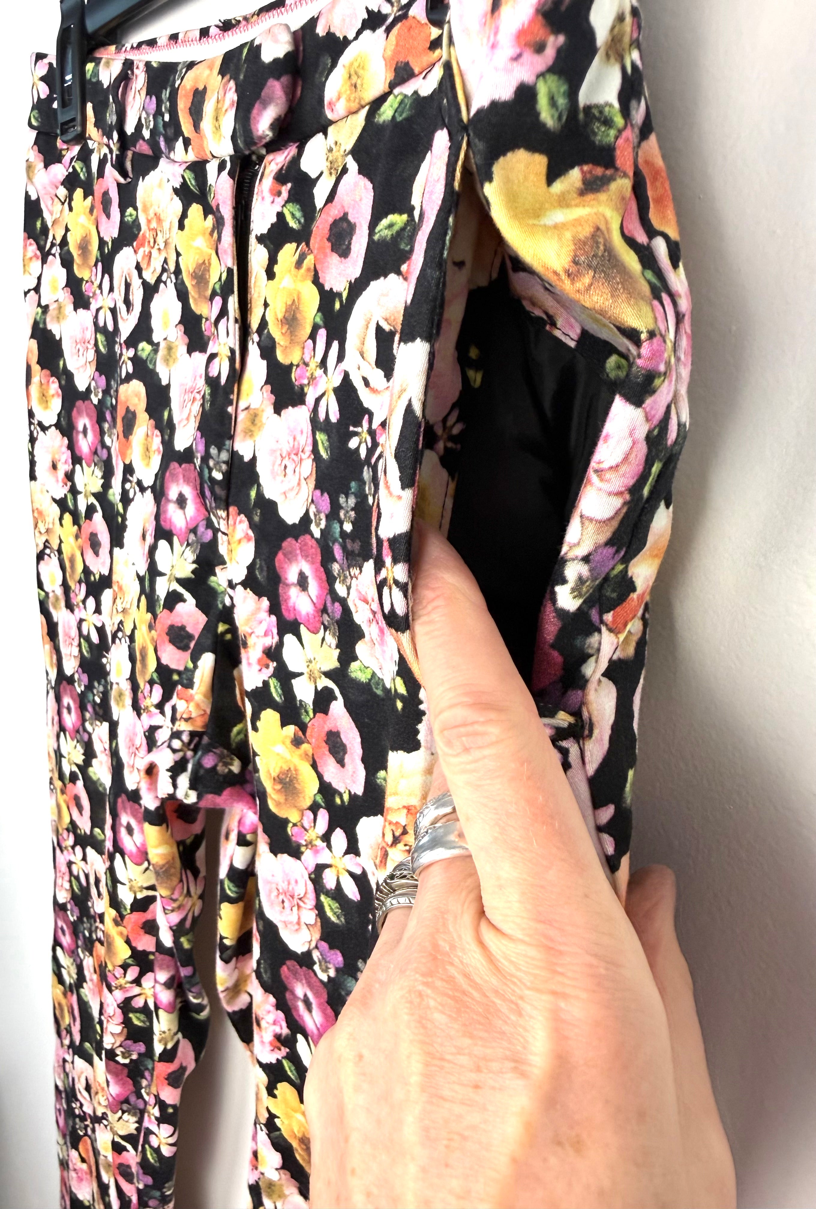 pocket detail on H&M Slim Fit Ankle Pants with floral pattern 
