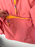 pouch on the front of LL Bean anorak jacket in coral and orange 