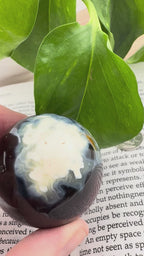 11 second video of carnelian sphere with druzy 