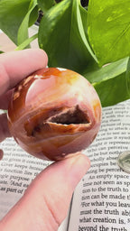 Video of Carnelian Sphere showing druzy up close 