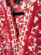 red and white peasant top women long sleeve close up of neck detail 