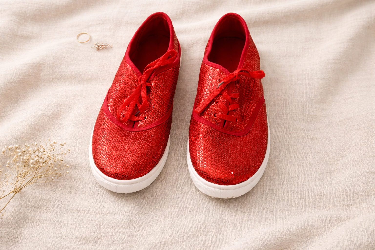 red sequinned sneakers on a cloth at Blue Sparrow Shop - size 9