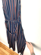 removable belt shown on back of NWT Wide leg hem detail navy striped jumpsuit women.