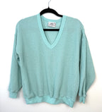 retro 80's style waffle knit sweater on hanger 