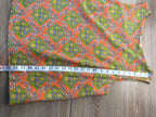 retro print tank measuring 23" from shoulder to hem