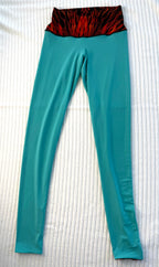 reverse side of Eva Varro Reversible Leggings — Feather Print & Solid Turquoise | Handcrafted in USA | Size XS at Blue Sparrow Shop 