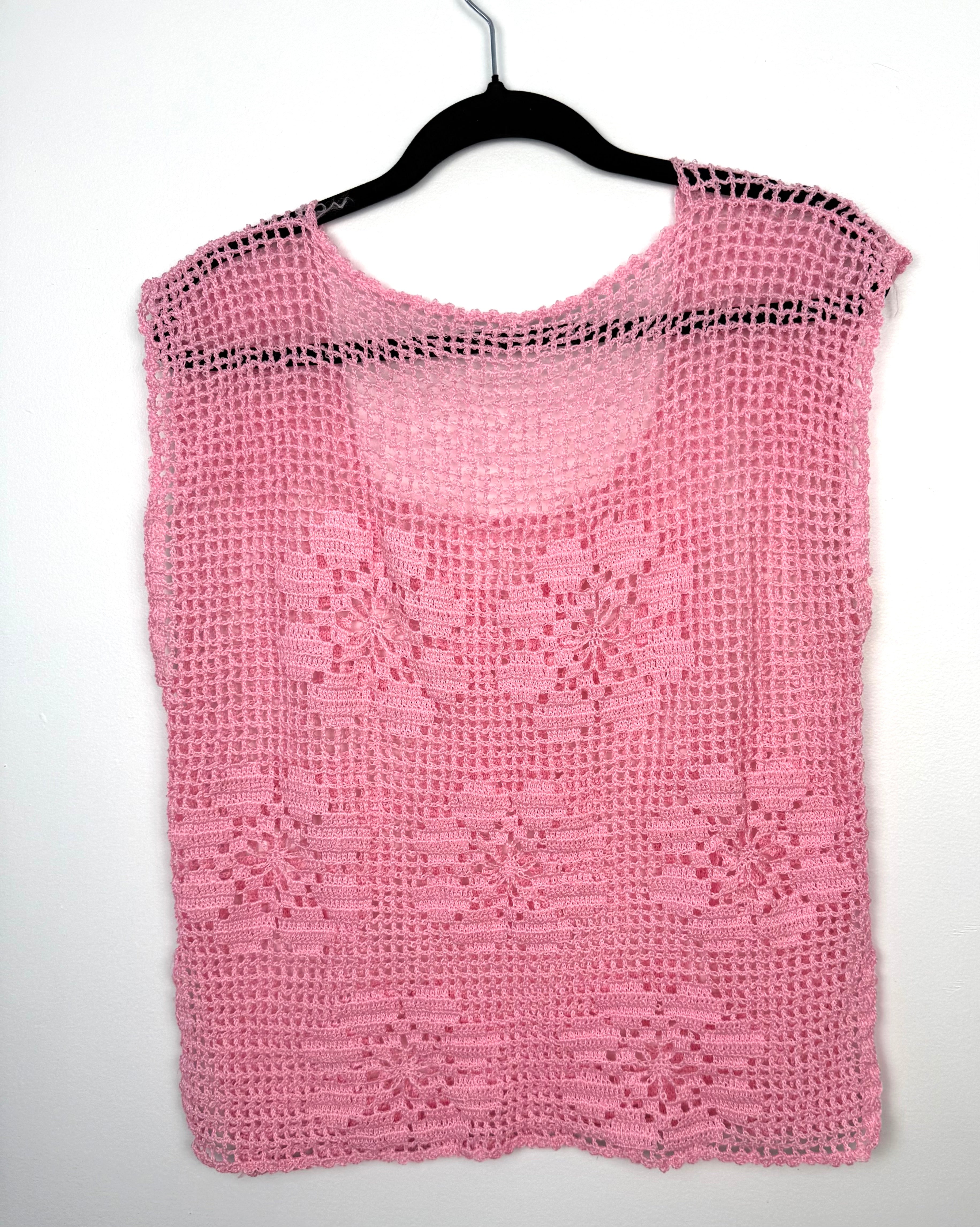 sheer pink crochet blouse cottagecore fairycore summer layering top on black hanger