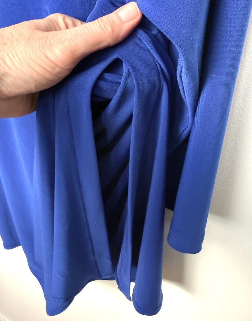side slit on Sympli Asymmetrical Cold-Shoulder V-Neck Top 