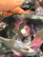 size tag inside back pocket of Lululemon floral capris | Size 6 at Blue Sparrow Shop 