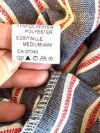 size tag on Made in Italy Cotton Linen Stripe Wide-Leg Jumpsuit — Denim Blue, Red & White | Pom-Pom Trim | Size M at Blue Sparrow Shop 