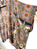 sleeve detail on Angie boho medallion print kimono in earth tones
