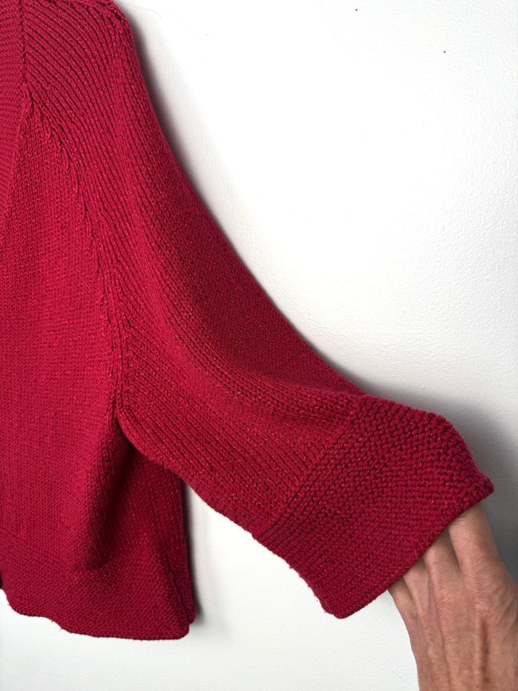 sleeve detail on front of jones new york red cardigan