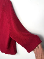 sleeve detail on front of jones new york red cardigan