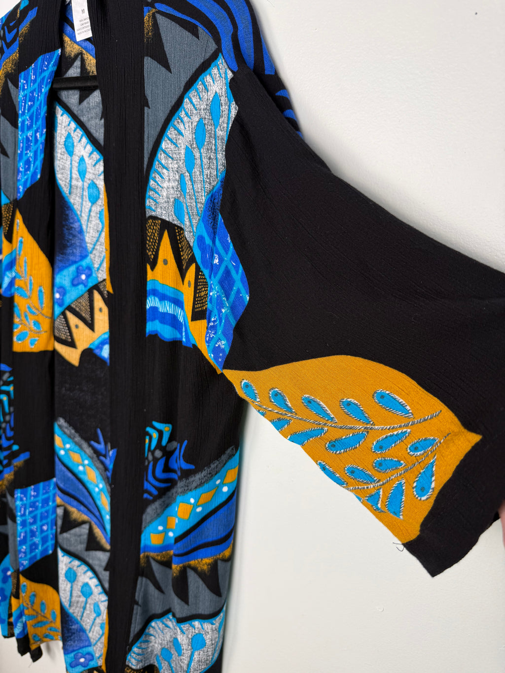 sleeve of Bold Geometric Print Open Kimono Cardigan | Size M at Blue Sparrow Shop