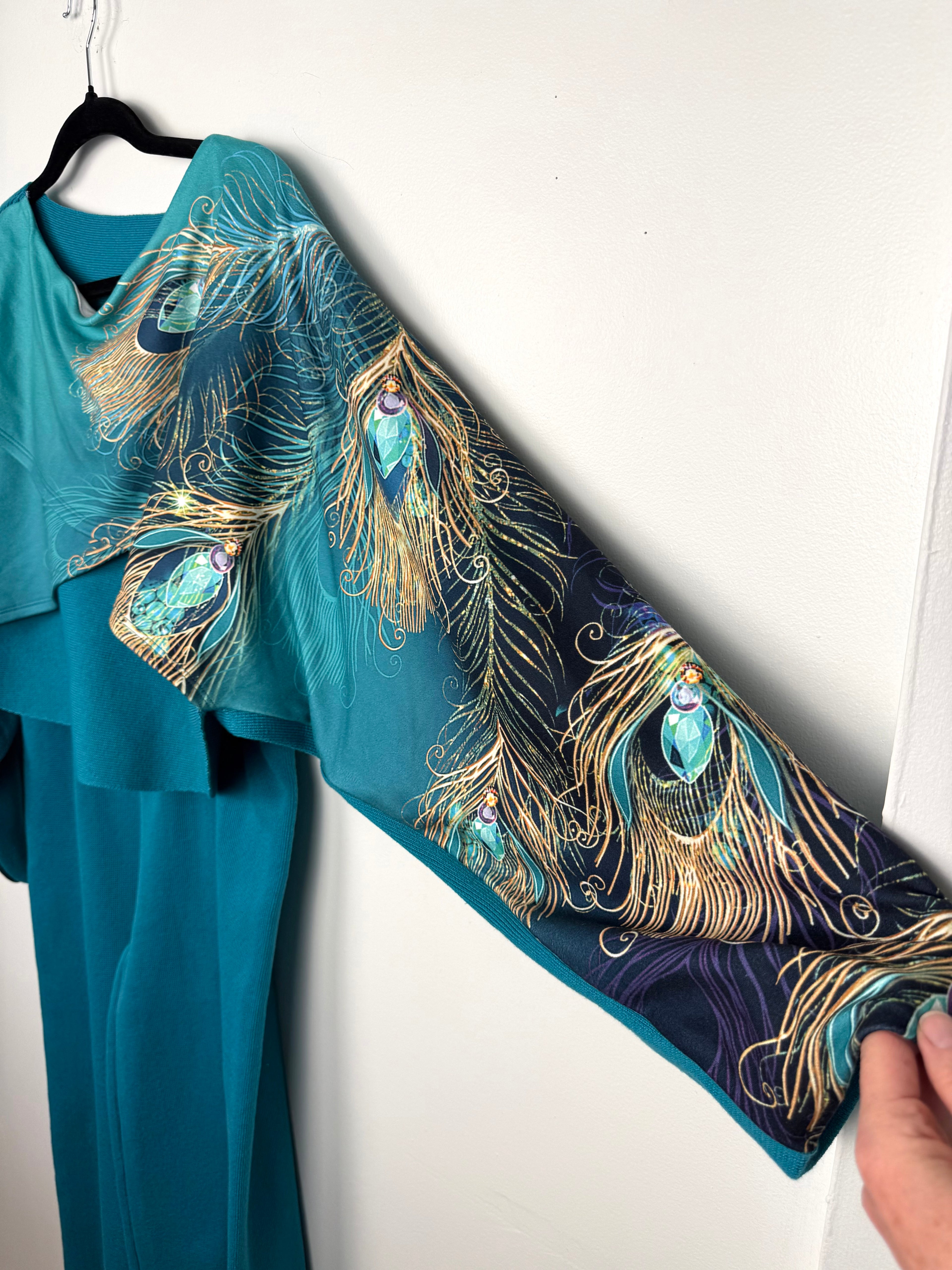 sleeve on Teal Peacock Print 2-Piece Knit Set — Wide-Leg Pants + Draped Top, Size XL at Blue Sparrow Shop