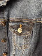 sleeveless denim jacket womens festival outfit layering piece pocket detail