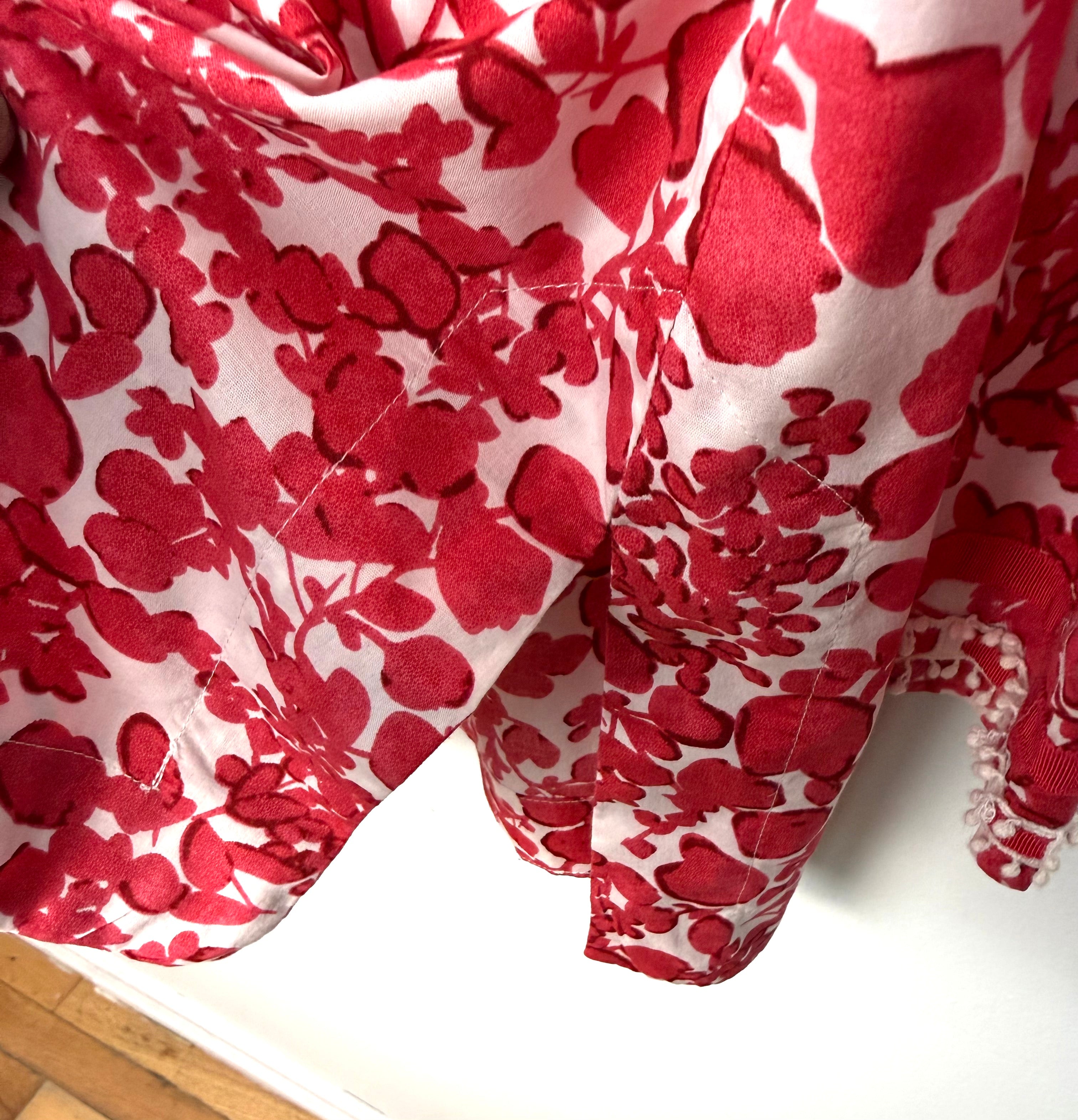 slit at bottom of lightweight red floral tunic women 
