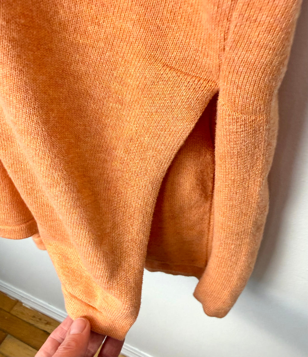 slit at hem of Marble UK brand knit kimono shawl or lightweight cardigan in peach 