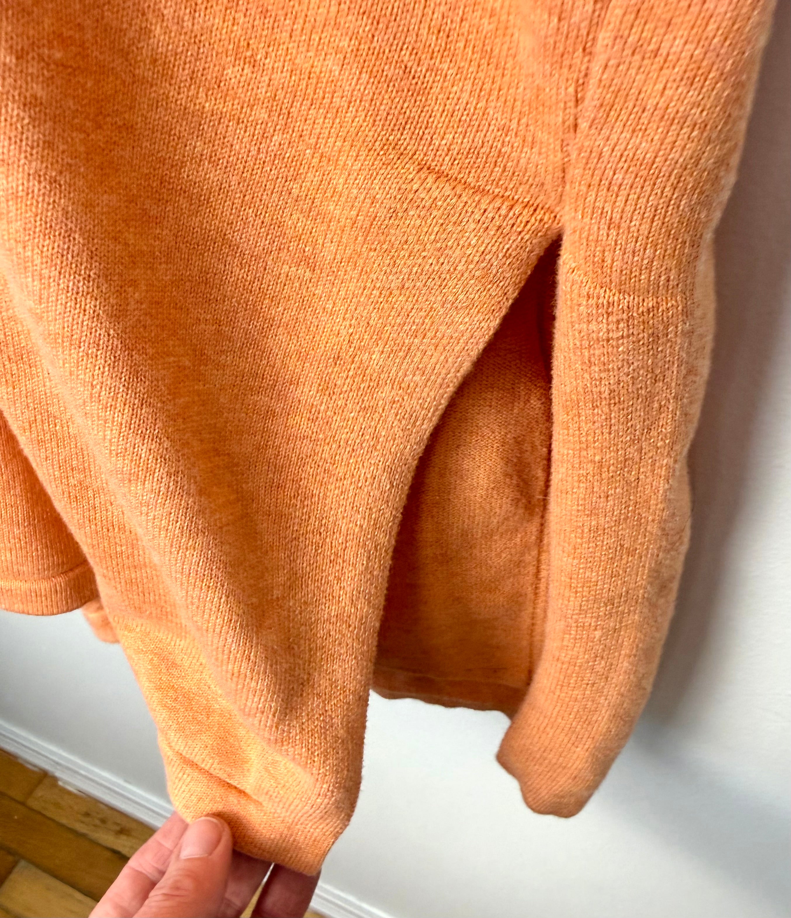 slit at hem of Marble UK brand knit kimono shawl or lightweight cardigan in peach 