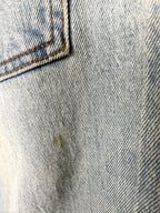 small mark on back of Abercrombie & Fitch Curve Love high rise mom jeans light wash distressed denim 