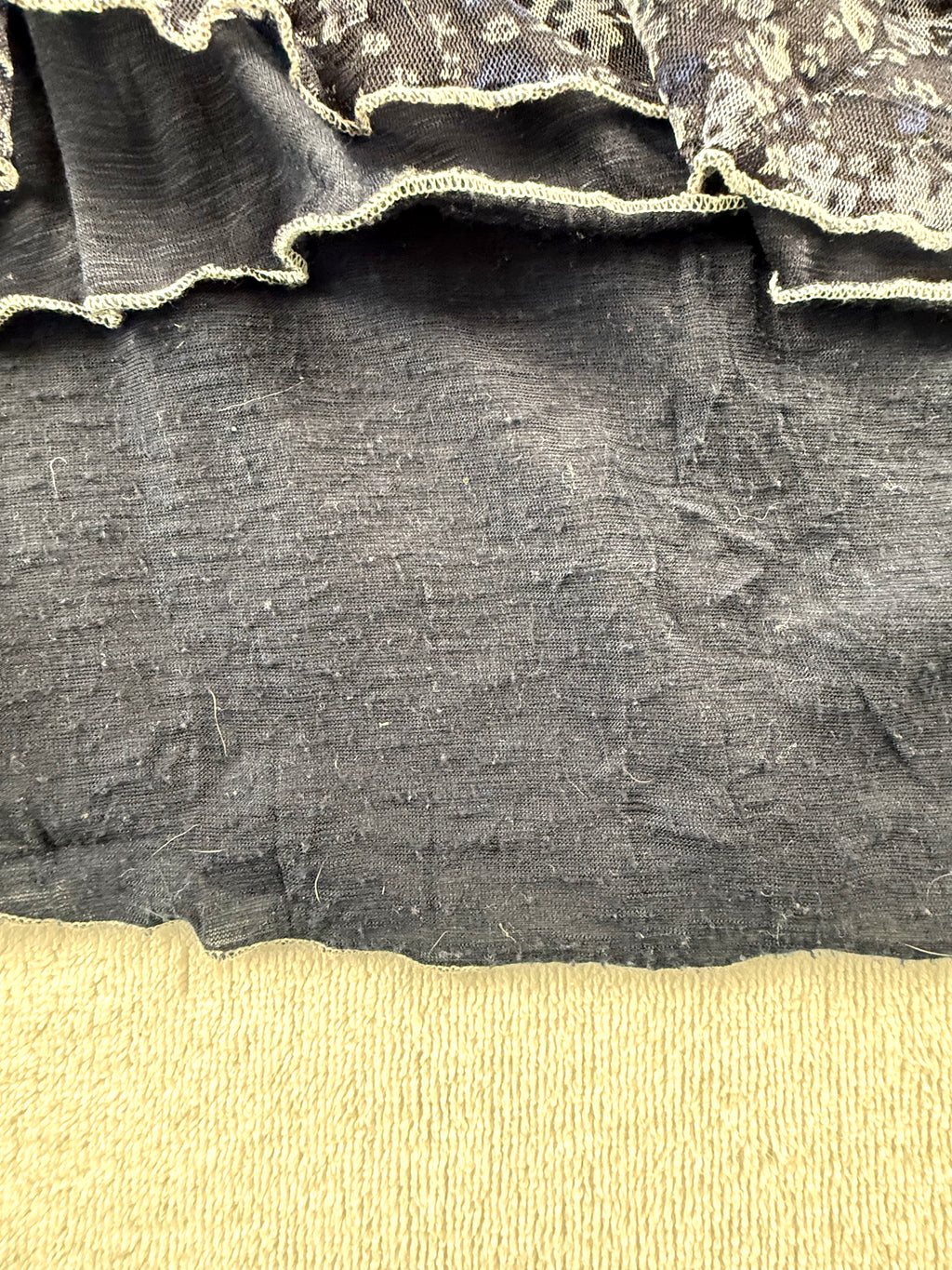 spot on bottom of dress with piliing