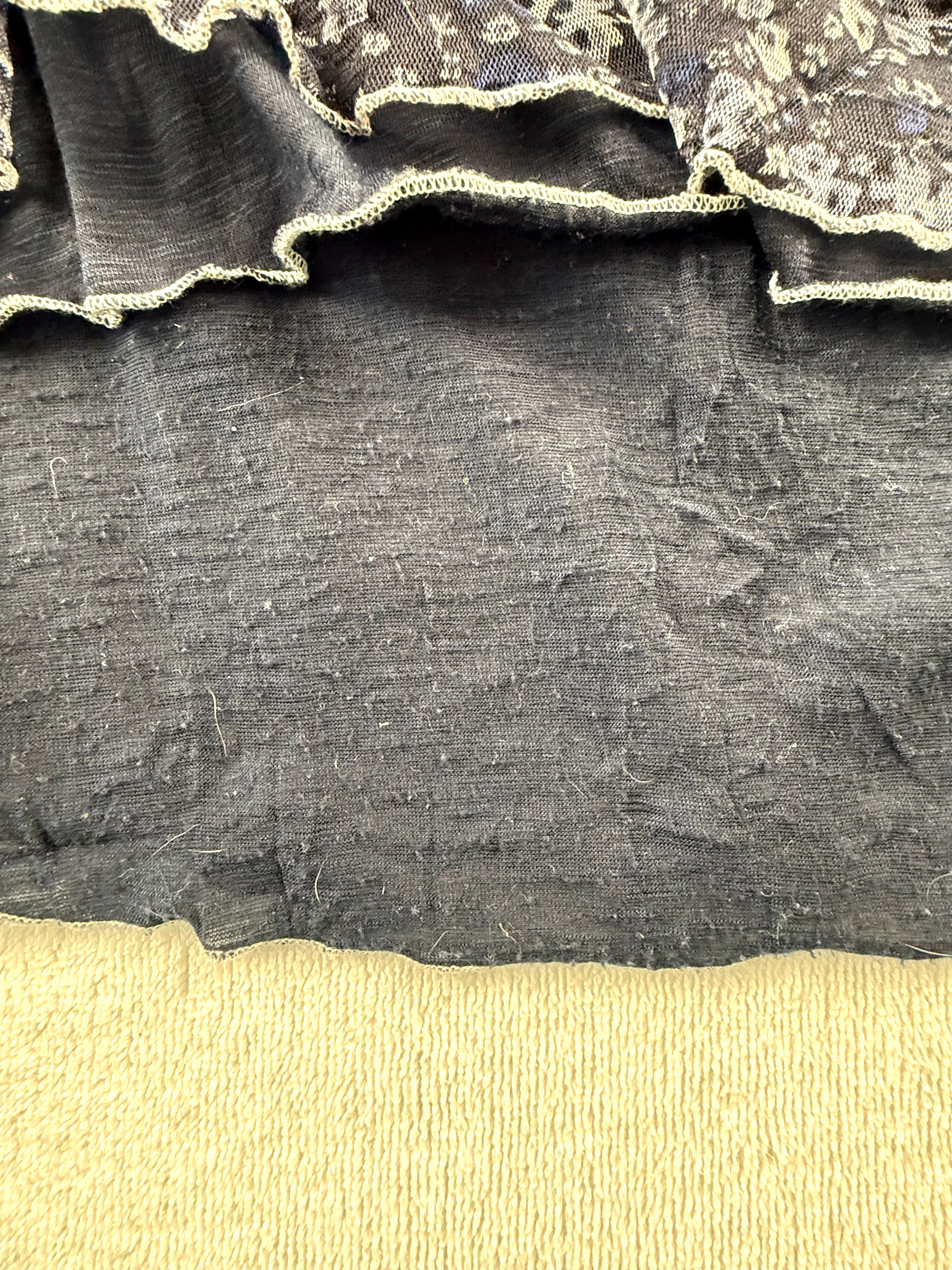spot on bottom of dress with piliing