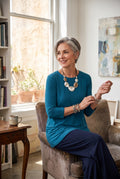 Sympli 3/4 Sleeve Top | Size 10  on ai woman sitting on edge of chair