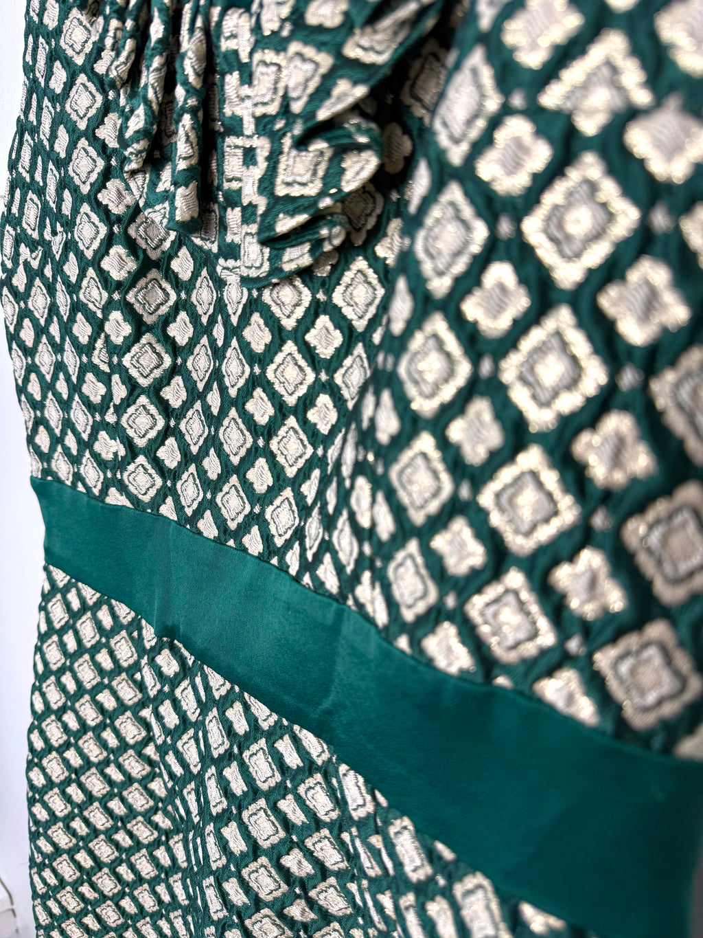 textured brocade cocktail dress with defined waist band