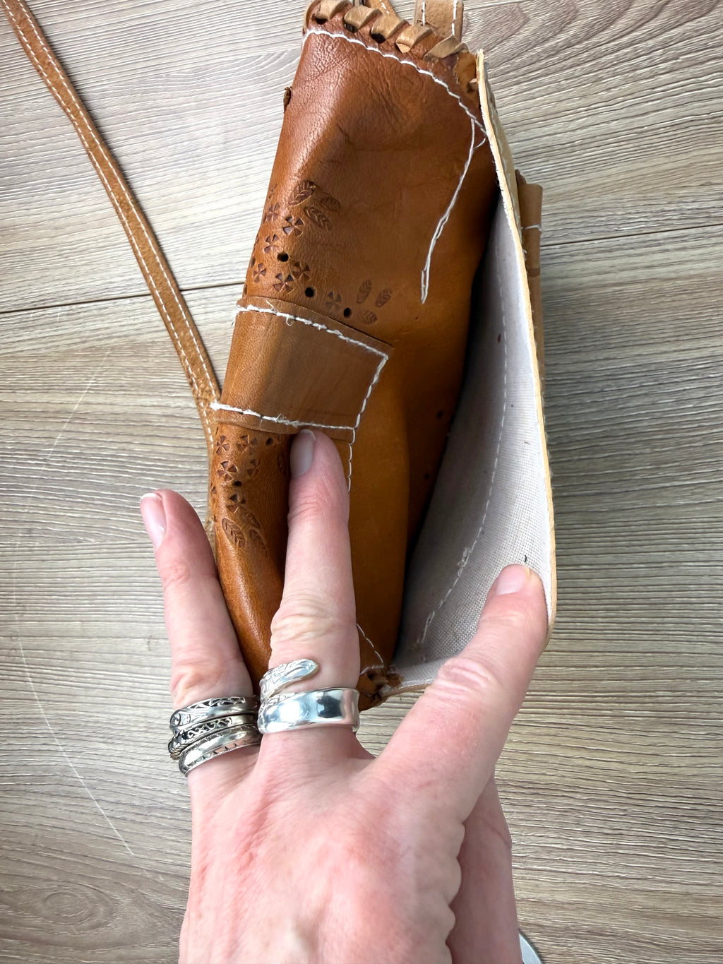 top view showing back pocket on intage Hand-Tooled Leather Crossbody Bag at Blue Sparrow Shop