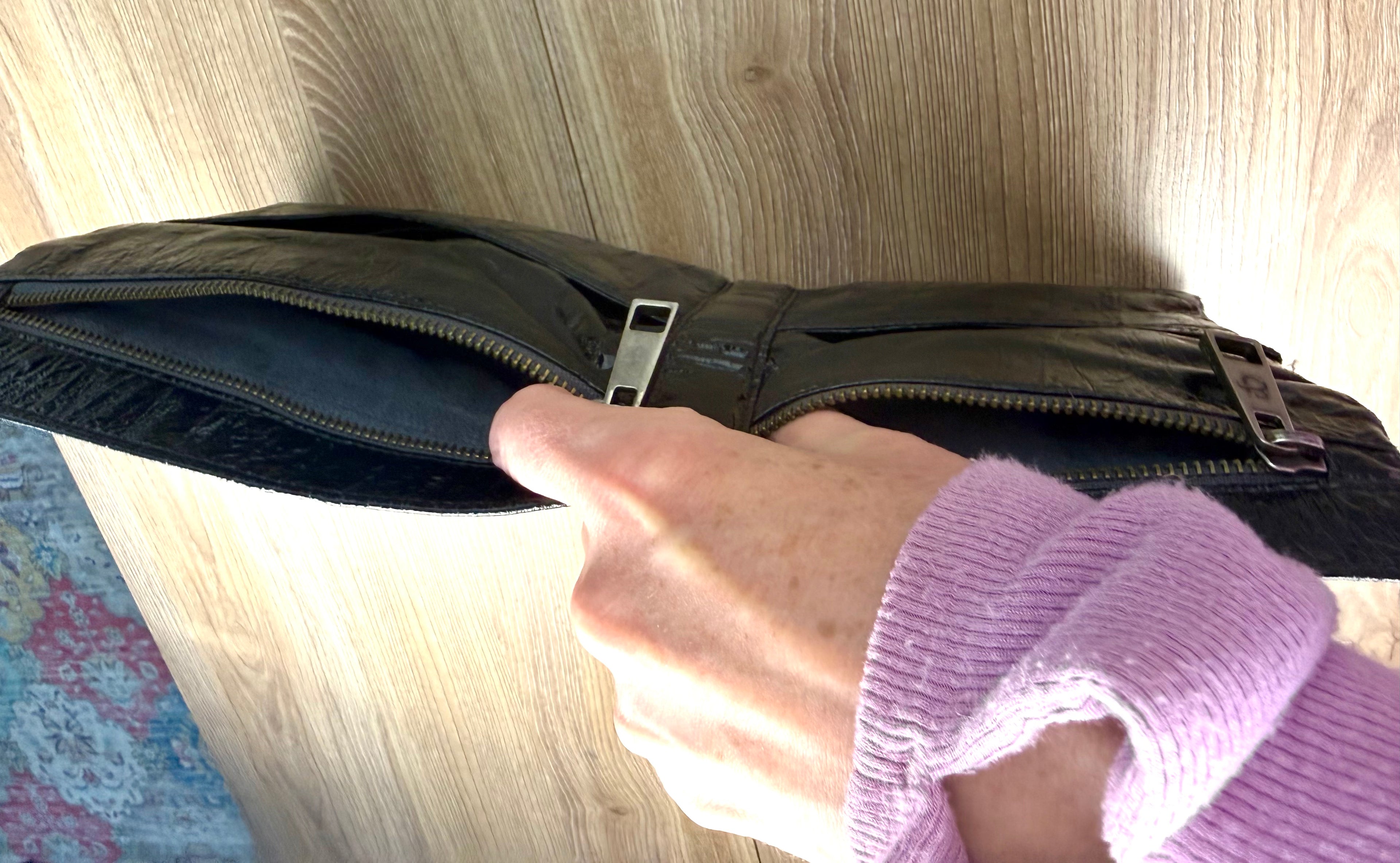 top view showing functioning pockets on the front of Matt & Nat Black Vegan Leather Clutch Bag