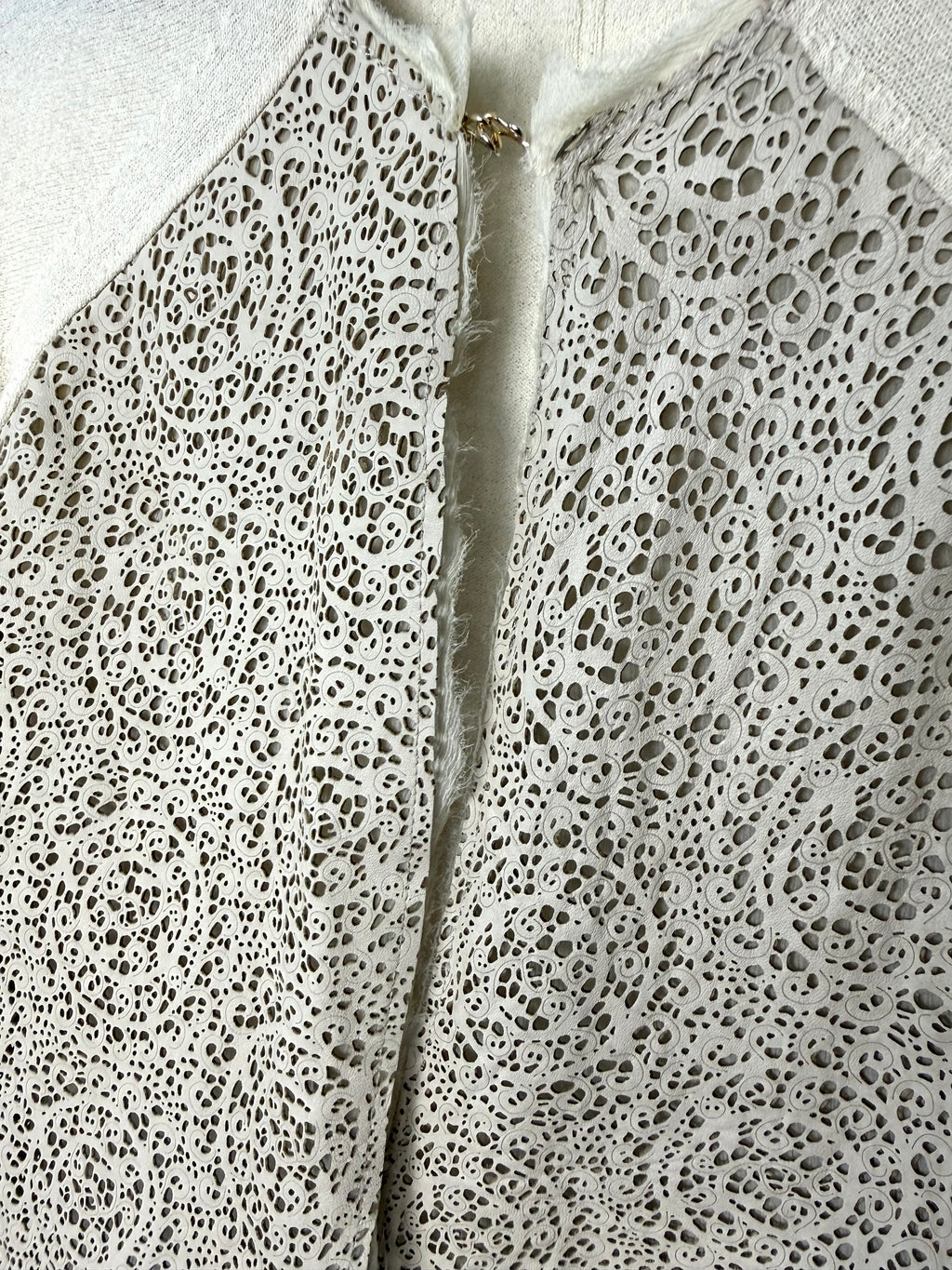 twin set simona barbieri beige cardigan with laser cut leather front panel up close detail of leather