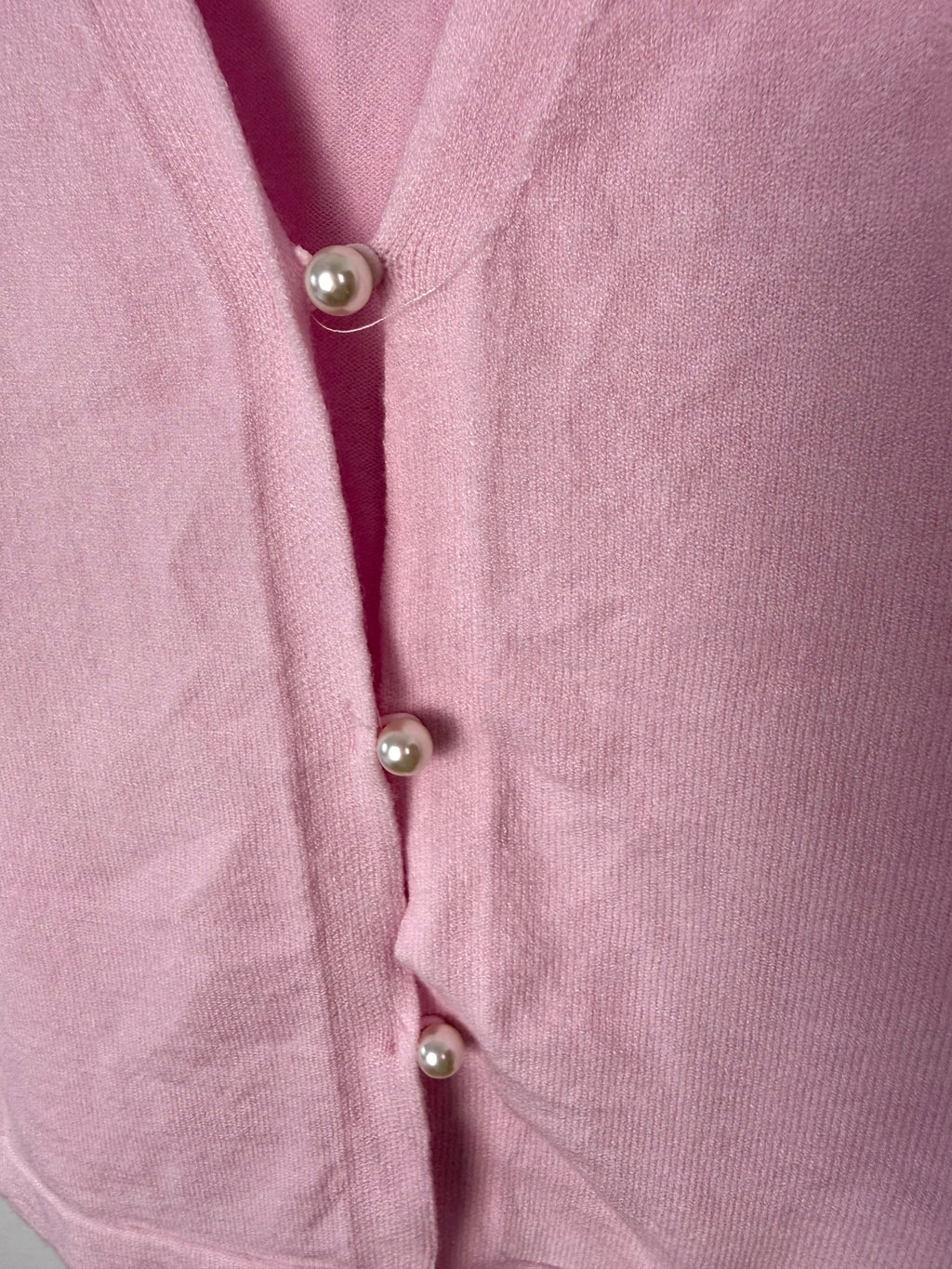 up close button detail on Soft Pink V-Neck Knit Vest Size S — Blue Sparrow